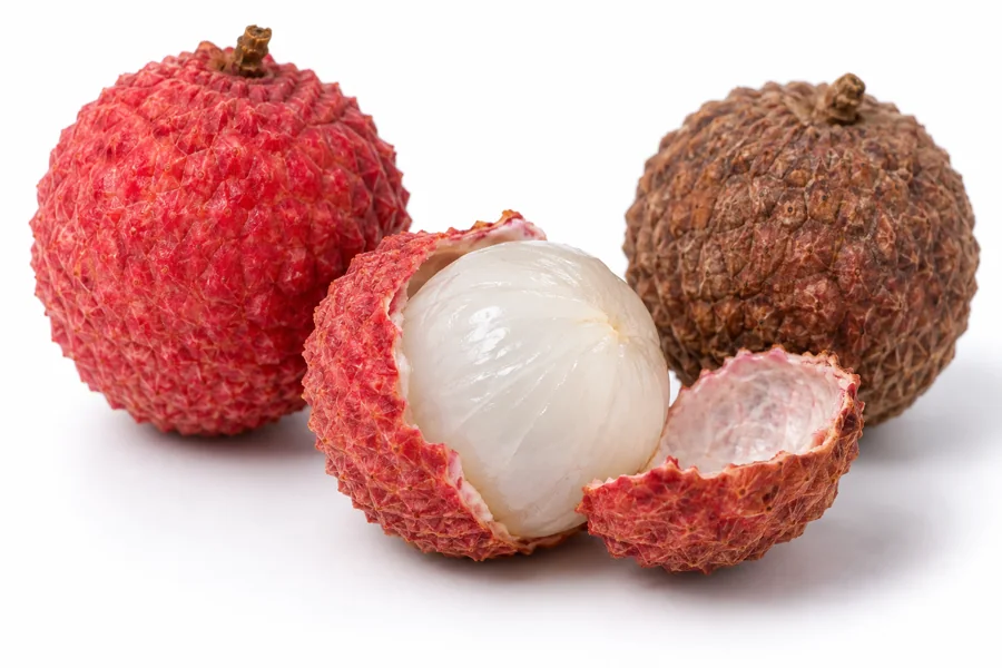 Fresh red lychee and browned peel with intact translucent flesh